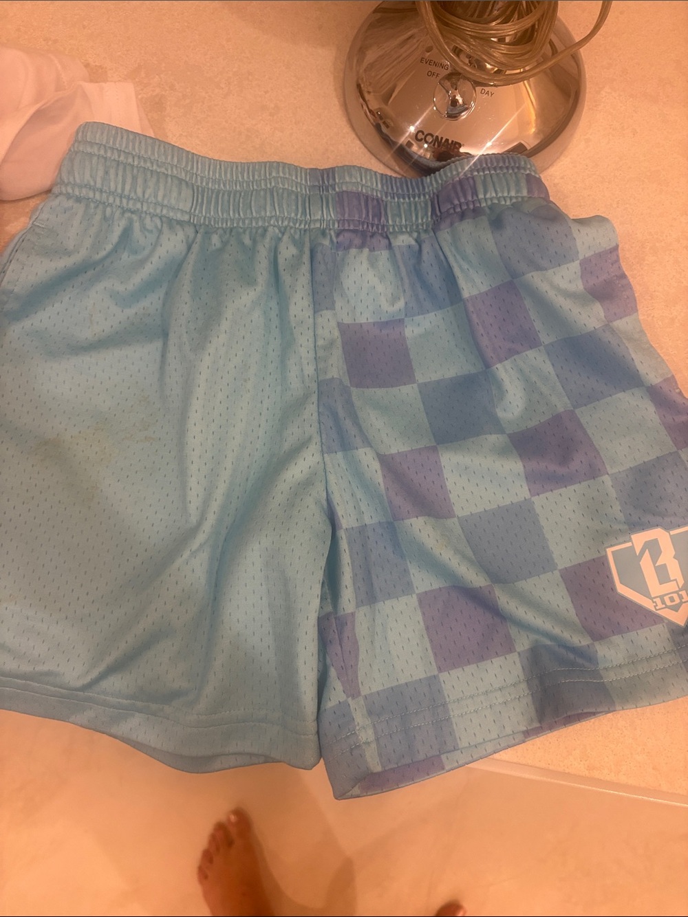 B101 checkerboard shorts